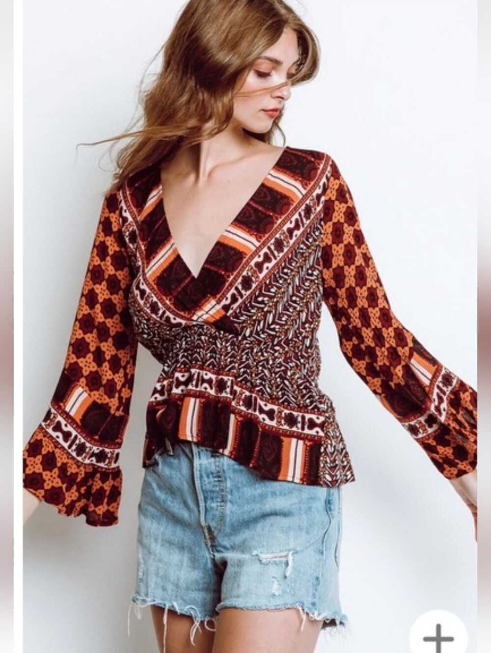 #298. Free People Rosalie Faux Wrap Puplum Top.
